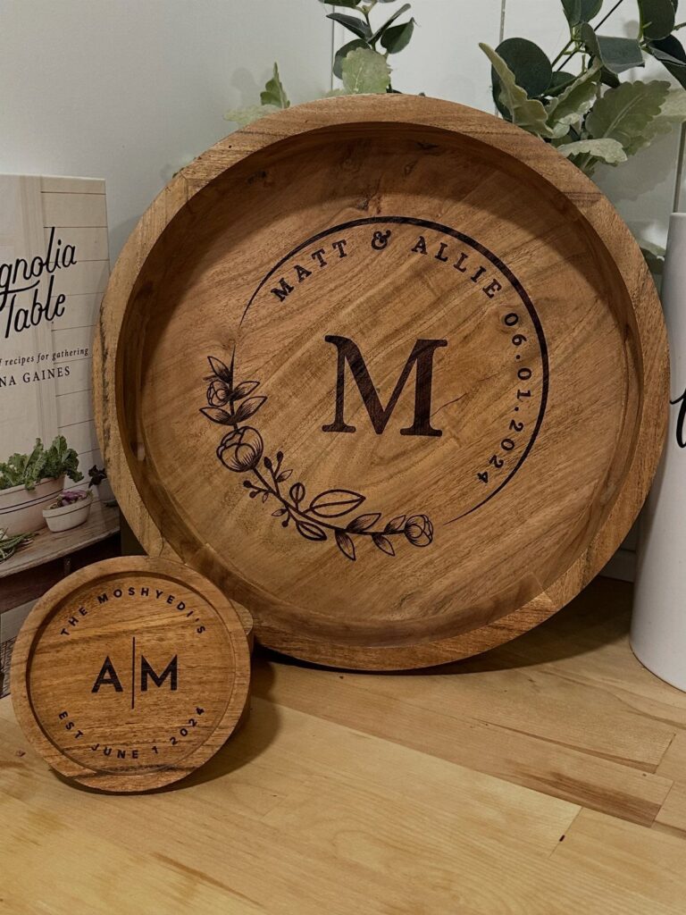 Round wooden serving tray and coaster engraved with a monogram and wedding date.