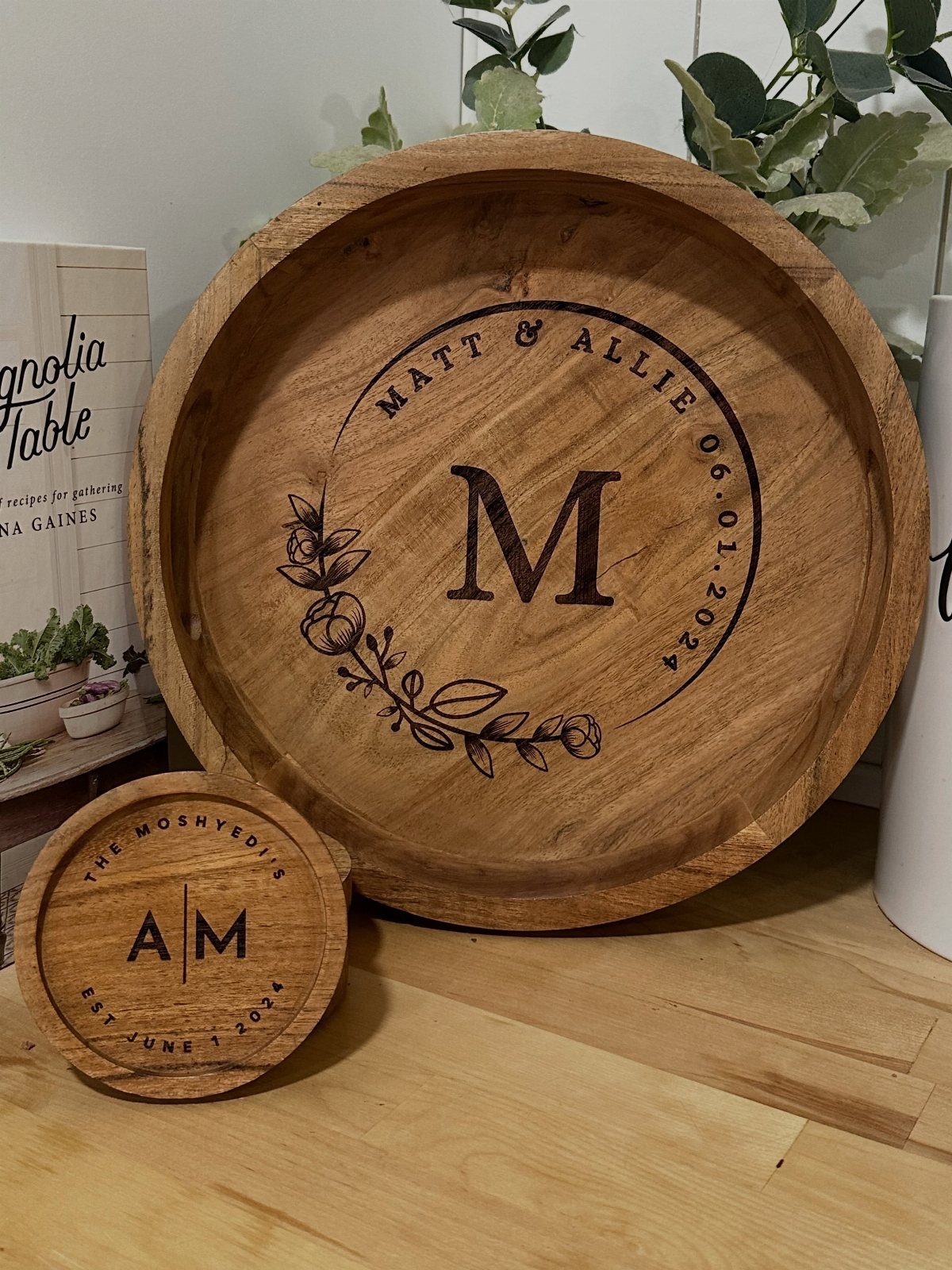 Round wooden serving tray and coaster engraved with a monogram and wedding date.